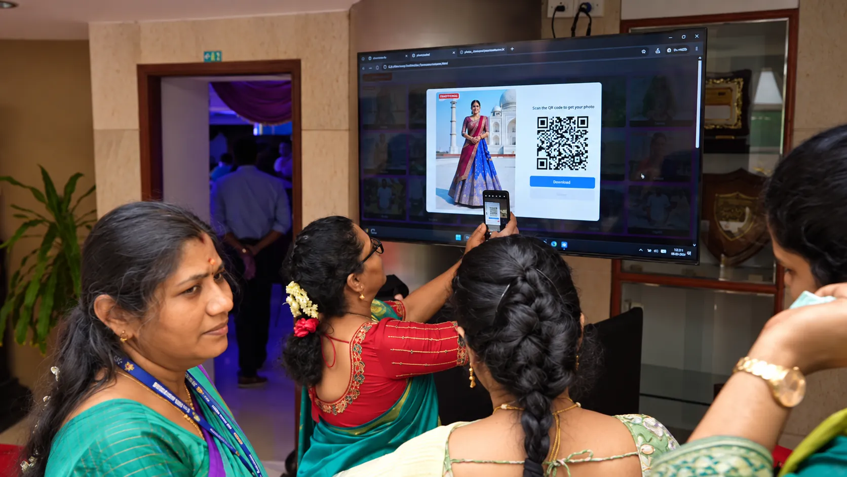 Guests scanning a QR code to download their AI portrait